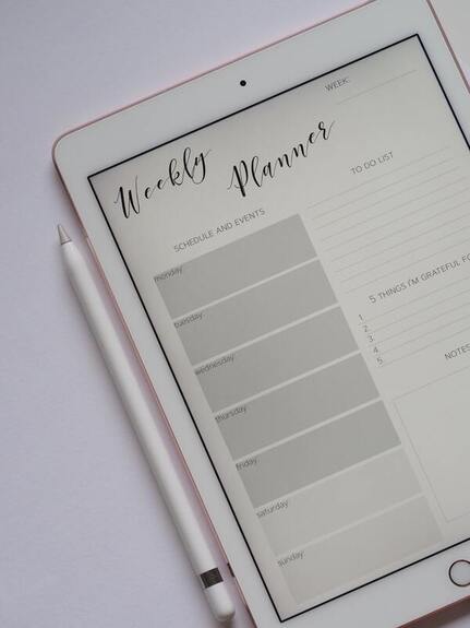 A successful entrepreneur's weekly planner on iPad